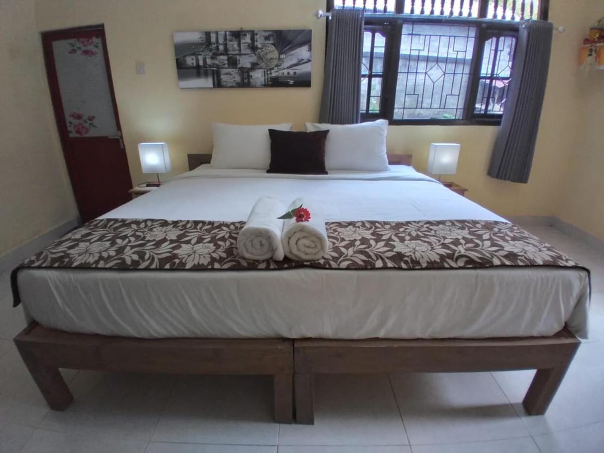 Rindu Homestay Undisan Bagian luar foto