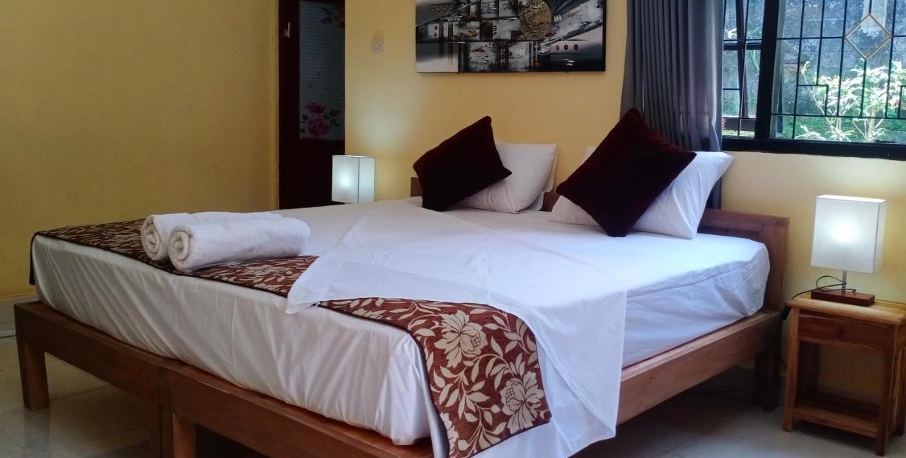 Rindu Homestay Undisan Bagian luar foto